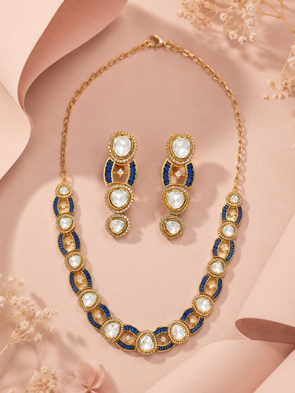 Aanura Oval Kundan Linked Necklace & Earrings