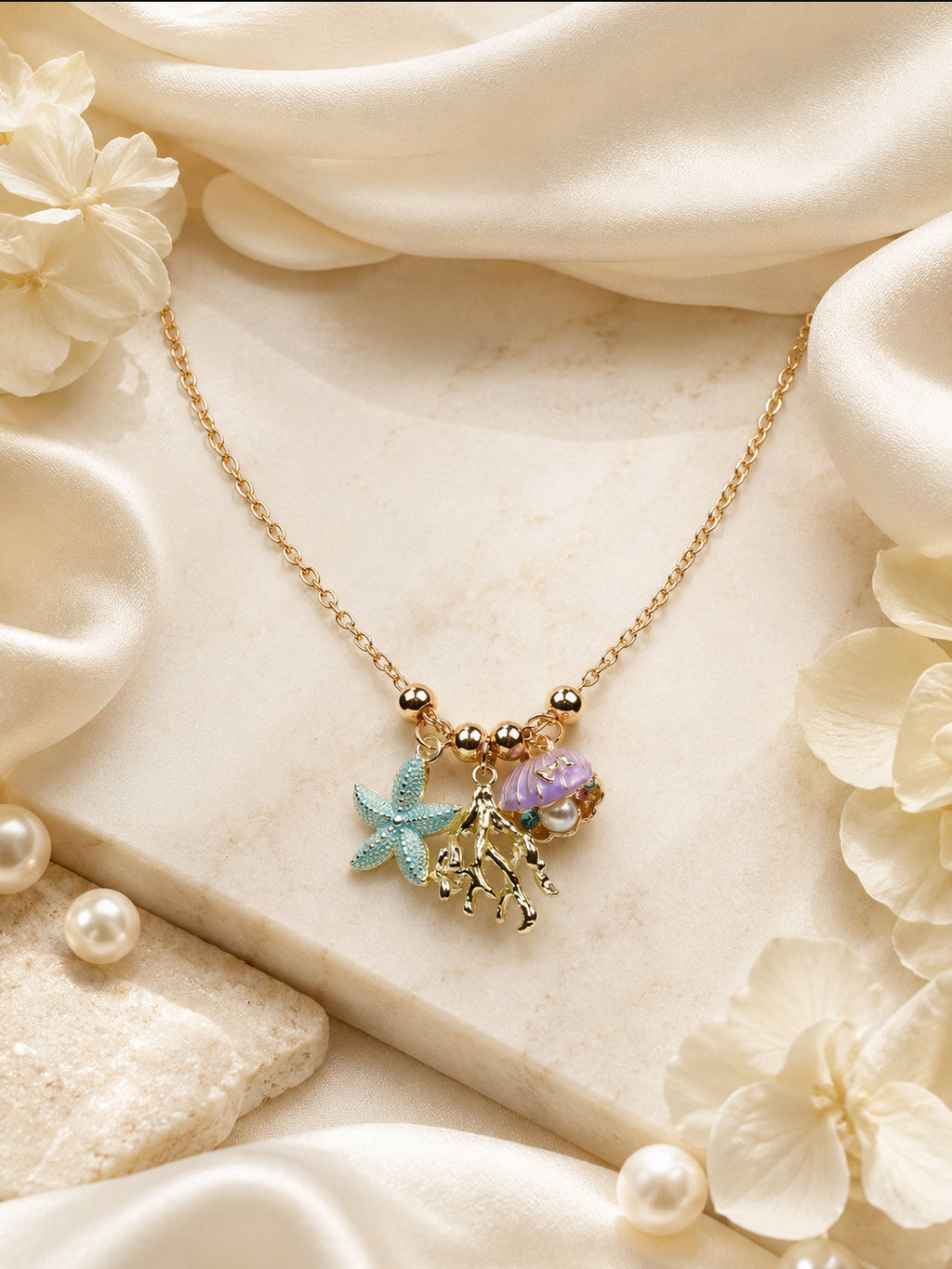 Aanura Ocean Charm Gold Necklace with Starfish, Shell & Coral