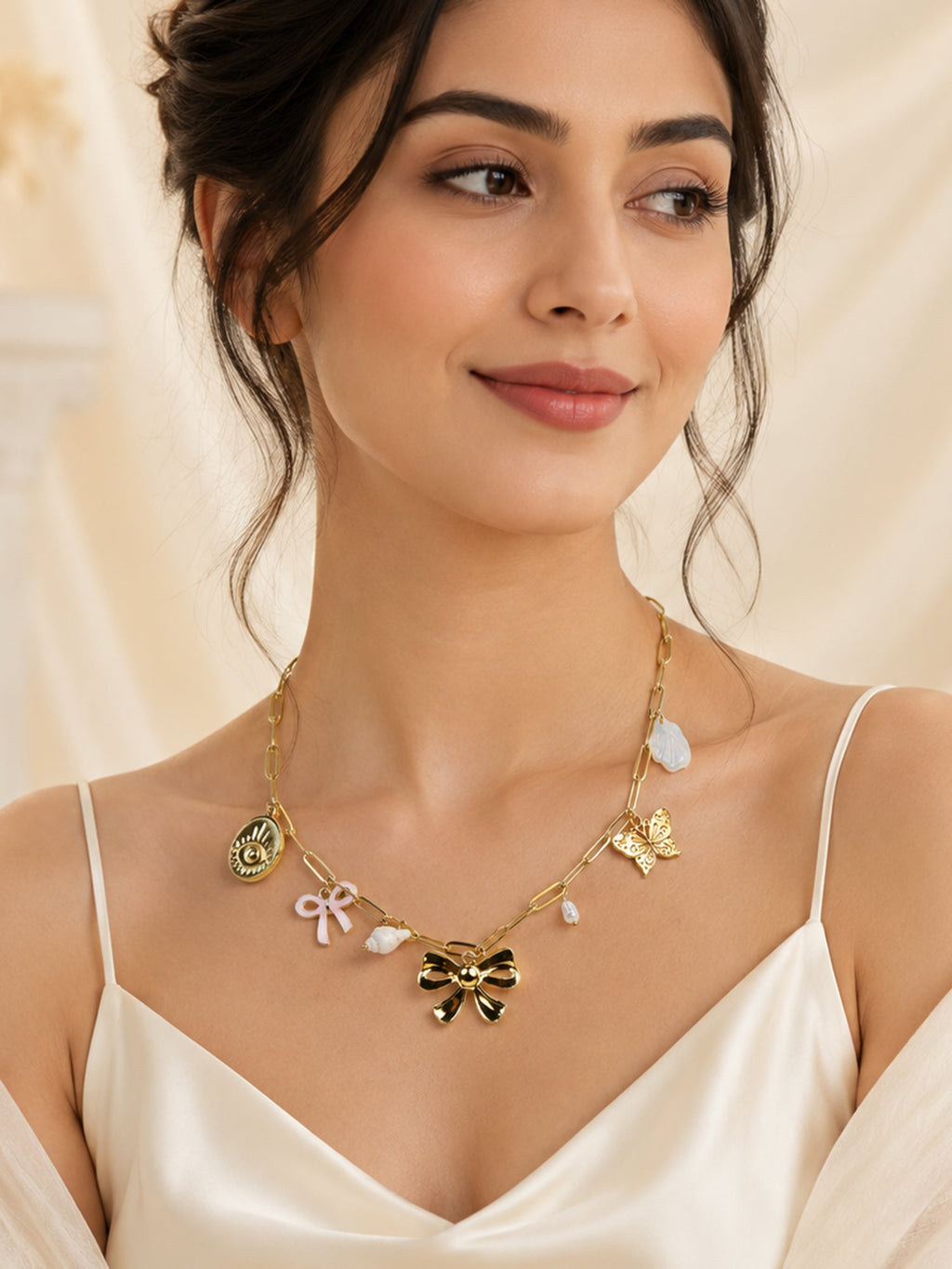 Aanura Gold Charm Necklace with Bow & Butterfly