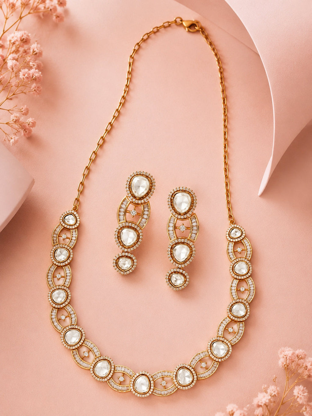 Aanura Oval Kundan Linked Necklace & Earrings